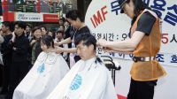 <b>IMF 극복 '무료 이발' 행사</b>