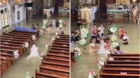 <b>"폭우도 못 막은 사랑"…허리까지 물 찬 성당서 결혼식 올린 필리핀 부부</b>