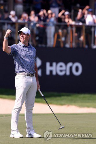 우승을 확정하고 기뻐하는 매킬로이[AFP=연합뉴스]