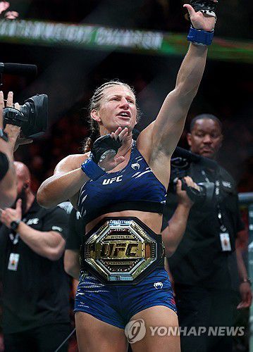 챔피언 벨트를 허리에 맨 해리슨[Imagn Image=연합뉴스]