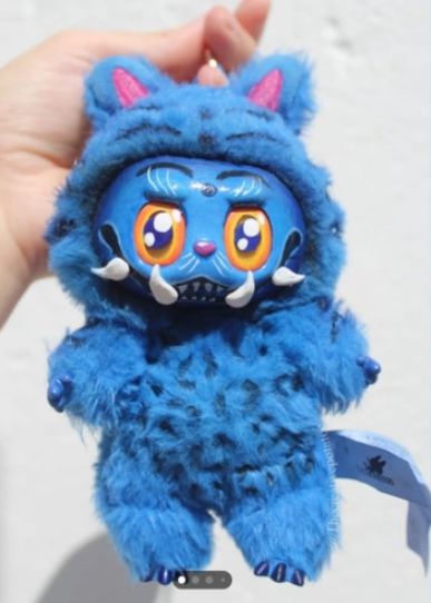 중국 완구 기업 팝아트의 인기 캐릭터 ‘라부부’에 케데헌의 호랑이 캐릭터 ‘더피’ 의상을 입힌 콘텐츠. [SNS 갈무리]