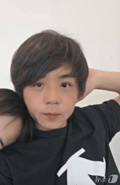 A 씨가 김성호 씨 어깨에 기대고 있는 사진 수정본(A 씨 제공.재판매 및 DB금지)