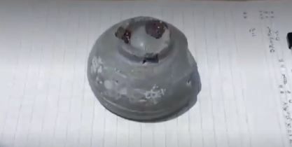 지난 7월 초 출토된 고려시대의 국화무늬 청자 잔. YTN 캡처