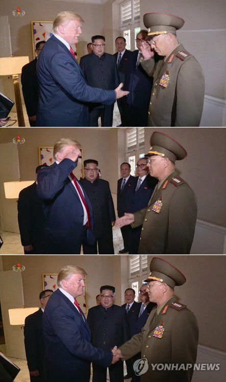 악수와 경례 엇갈린 트럼프 대통령-노광철 인민무력상(서울=연합뉴스) 북한 조선중앙TV는 14일 북미정상회담을 위해 지난 10∼12일 싱가포르를 방문한 김정은 국무위원장의 활동 영상을 공개했다. 도널드 트럼프 미국 대통령은 도열한 북측 수행원 가운데 하나인 노광철 인민무력상(육군 대장)에게 악수를 청했지만, 노 대장은 고개를 약간 숙이며 거수경례로 인사했다. 이에 트럼프 대통령이 즉각 거수경례로 화답했으나 노 대장이 그사이에 악수하기 위해 손을 내미는 상황이 연출됐다. 악수와 경례가 각각 엇갈린 둘은 결국 웃으며 악수에 성공했고, 김 위원장은 이를 보면서 미소를 지었다. 2018.6.15      [국내에서만 사용가능. 재배포 금지. For Use Only in the Republic of Korea. No Redistribution] nkphoto@yna.co.kr