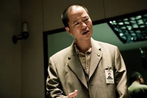 황병국 감독. 영화 <부당거래>에 국선변호인으로 출연한 모습.