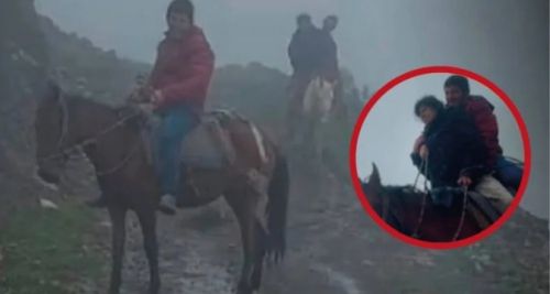 페루 고산지대 사야푸요 주민들이 탈진한 여교사를 말에 태우고(원 안) 학교를 향해 이동하고 있다. 출처=레벨라시온