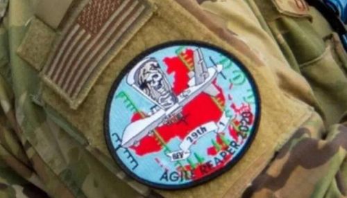 중국 지도 및 MQ-9 이미지가 들어간 미군 완장 [출처 에어포스 매거진. 환구시보 캡처. 재판매 및 DB 금지]