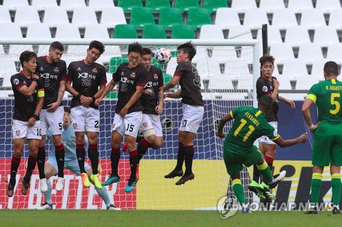 서울과 베이징의 경기 장면.[AFP=연합뉴스]