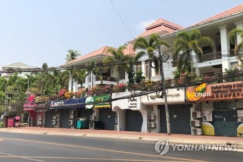 '침묵 파업'에 동조해 일제히 문을 닫은 양곤 시내 상점들. 2021.3.24[AFPTV/AFP=연합뉴스]