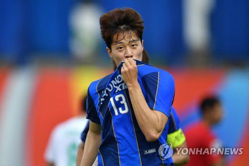 선제 결승골 해결한 김민준[AFP=연합뉴스]