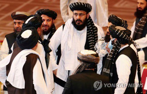 작년 12월 카타르 도하에서 열린 아프간 정부와의 협상에 참석한 탈레반 대표단 [로이터=연합뉴스 자료사진]