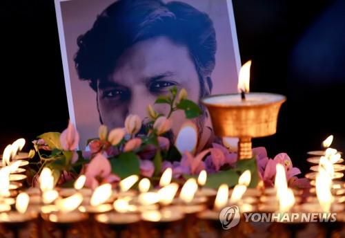 7월 16일 아프간서 취재 중 사살된 로이터 사진기자 추모식[로이터=연합뉴스]