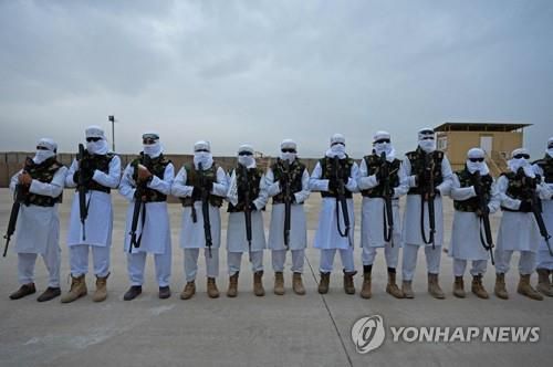 지난 1월 16일 아프간 미아마나에서 시가행진 중인 탈레반.[AFP 연합뉴스 자료사진. 재판매 및 DB 금지]