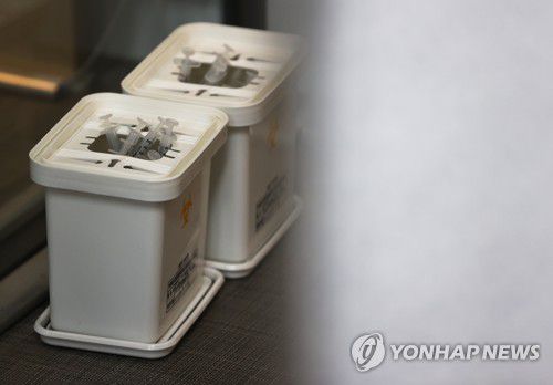 접종 후 폐기된 주사기[연합뉴스 자료 사진]