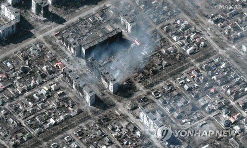 러시아 폭격에 초토화한 마리우폴 주택가[AFP 연합뉴스 자료사진. DB 및 재판매 금지]