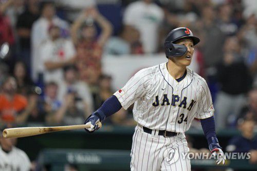 WBC 4강전서 7회 극적인 동점 3점포 터뜨린 요시다 [AP=연합뉴스]