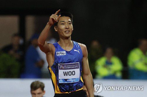 세리머니하는 우상혁[로이터=연합뉴스 자료사진]