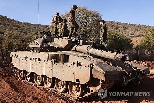 레바논 국경지대에 배치된 이스라엘 탱크[AFP 연합뉴스 자료사진. 재판매 및 DB 금지]