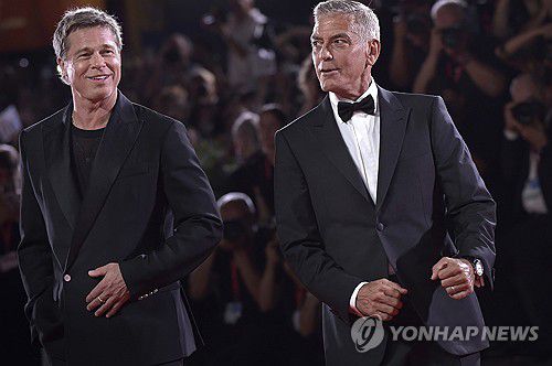 1일(현지시간) 이탈리아 베네치아영화제 참석한 배우 브래드 피트(왼쪽)와 조지 클루니(오른쪽) [UPI=연합뉴스. 재판매 및 DB 금지]