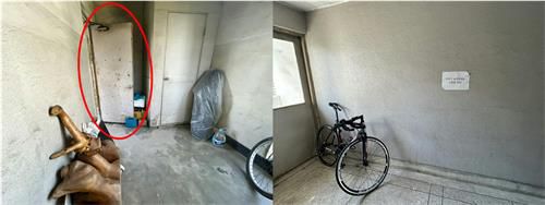 송파구의 한 아파트 계단에 자전거 등이 놓여있고, 방화문(붉은색 원)도 열려있다.[촬영 김연수]