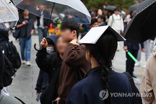 갑자기 내린 비[연합뉴스 자료사진]