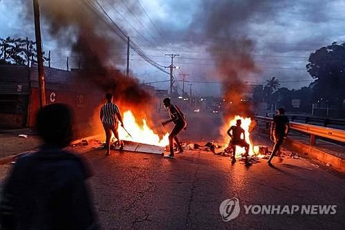 모잠비크 수도 마푸투에서 재개된 대선 불복 항의 시위[AFP 연합뉴스 자료사진. 재판매 및 DB 금지]