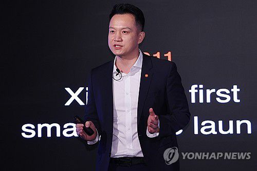 샤오미 소개하는 조니 우 사장(서울=연합뉴스) 진연수 기자 = 조니 우 샤오미코리아 사장이 15일 서울 종로구 포시즌스 호텔에서 열린 샤오미코리아 법인 설립 후 첫 기자간담회에서 발표하고 있다. 2025.1.15 jin90@yna.co.kr