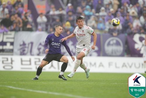 마테우스와 이현용[한국프로축구연맹 제공. 재판매 및 DB 금지]