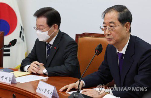 한덕수 대통령 권한대행 국무총리와 더불어민주당 이재명 대선 후보 [연합뉴스 자료사진]