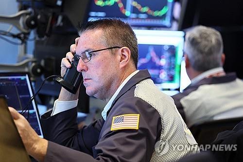 뉴욕증권거래소의 트레이더[AFP 연합뉴스 자료사진. 재판매 및 DB 금지]