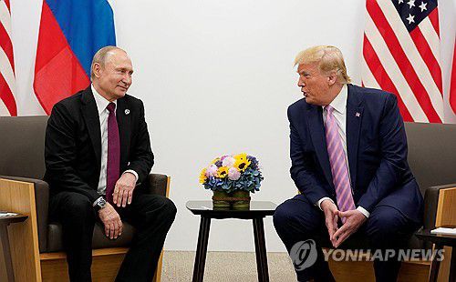 2019년 일본 오사카 G20 정상회의에서 만난 푸틴-트럼프[로이터=연합뉴스 자료사진. 재판매 및 DB 금지]