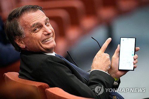 함박 웃는 자이르 보우소나루 전 브라질 대통령[브라질리아 AP=연합뉴스. 재판매 및 DB 금지]