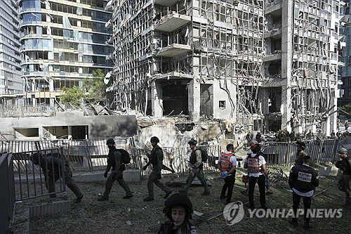 이란의 미사일 공격을 받은 이스라엘[AP=연합뉴스. 재판매 및 DB 금지]