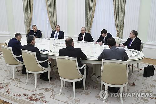 푸틴, 이란 외무장관 회동[AP/크렘린풀 연합뉴스. 재판매 및 DB 금지]