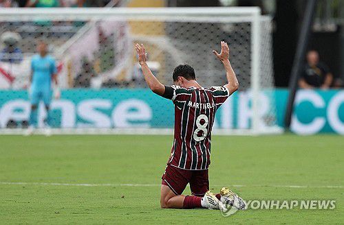 선제골을 넣은 플루미넨시 마르티넬리의 세리머니 모습.[로이터=연합뉴스]