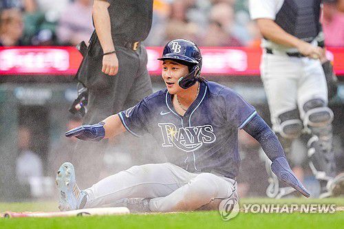 6회 홈에 슬라이딩하며 기뻐하는 김하성[AFP=연합뉴스]