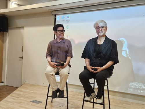 외교부 '꿈꾸는 사진관' 영화 상영회의 정초신(오른쪽) 감독과 작곡가 장태화 씨[촬영 노재현]