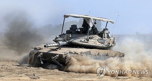 가자지구 작전지역 들어서는 이스라엘군 탱크[UPI 연합뉴스 자료사진. 재판매 및 DB 금지]