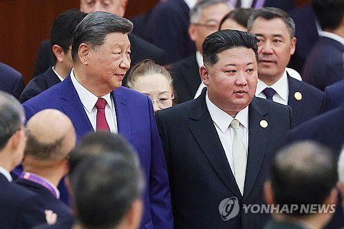 시진핑 중국 국가주석(좌)과 김정은 북한 국무위원장(우)[타스 연합뉴스 자료사진. 재판매 및 DB 금지]