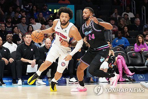 좌측부터 케이드 커닝햄과 노먼 파월[AP=연합뉴스]