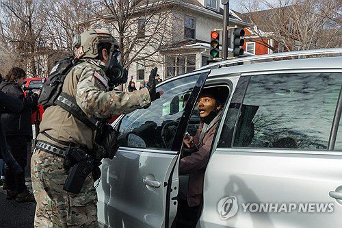 미 미네소타주에서 단속 중인 이민 당국 요원[EPA=연합뉴스. 재판매 및 DB 금지]