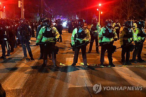 미니애폴리스의 시위 현장[AFP=연합뉴스] 2026.1.14