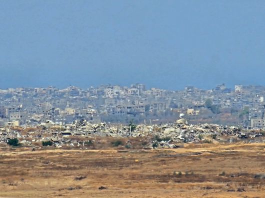 21일(현지시간) 이스라엘 남부 스데로트 가바트 코비 전망대에서 바라본 가자지구 모습. 대부분 건물이 폐허가 돼있다. 공동취재단