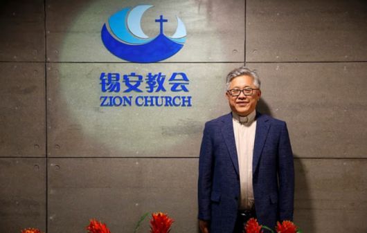 중국 비공식 기독교단체인 시온교회의 진밍리 목사(사진). 지난 10일 저녁 자택에서 체포됐다. 로이터 연합뉴스