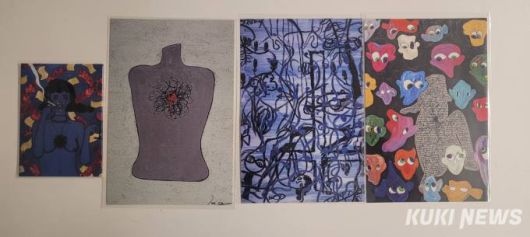 김히어라가 안길호 감독에게 보여준 그림들. 그는 이 그림을 마그넷과 엽서로 제작해 기자들에게 선물했다.   사진=이은호 기자