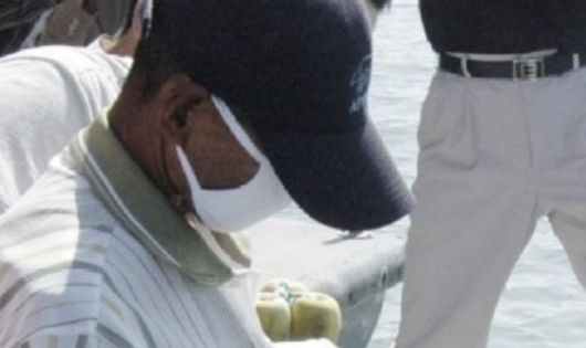 보성 어부 살인 사건 범인 오종근이 체포 직후 현장검증을 하고 있는 모습. 연합뉴스