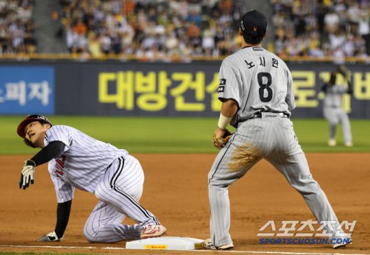 28일 잠실구장에서 열린 LG 트윈스와 한화 이글스의 경기. 7회말 무사 1,2루 LG 구본혁 타석 때 아쉬운 중계 플레이로 아웃카운트를 올리지 못한 한화 노시환. 잠실=박재만 기자 pjm@sportschosun.com/2025.05.28/