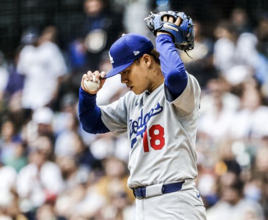 Los Angeles Dodgers starting pitcher Yoshinobu Yamamoto reacts after walking Milwaukee Brewers catcher William Contreras in the first inning of the MLB game between the Los Angeles Dodgers and the Milwaukee Brewers at American Family Field in Milwaukee, Wisconsin, on Monday, July 7, 2025. Photo by Tannen Maury/UPI연합뉴스
