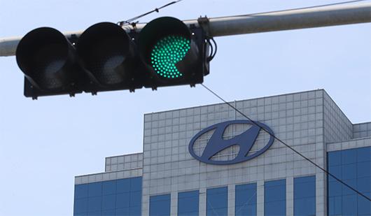 Hyundai Motor ups fullyear sales target while recall cuts Q3 income to