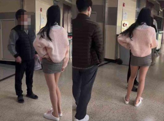 한 여학생이 남자 교사와 다투는 영상이 공개돼 논란이 일고 있다. [사진출처 = 온라인커뮤니티]